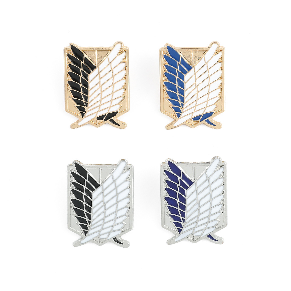 Collectible Vintage Brooches - Vintage vleugelvormige emaille broches, decoratieve badges